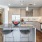 a kitchen with a table and chairs